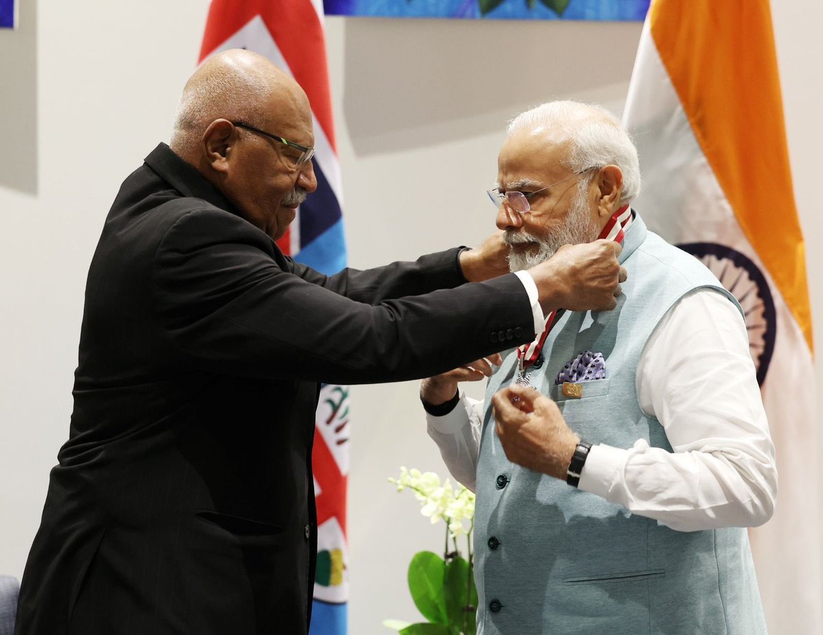 DrSukantaBJP's tweet photo. A proud moment for every Indian. 

Hon’ble PM Shri @narendramodi conferred with the highest honour of Fiji by the Hon’ble PM of Fiji - Companion of the Order of Fiji in recognition of his global leadership. https://t.co/hXl47RkgDi