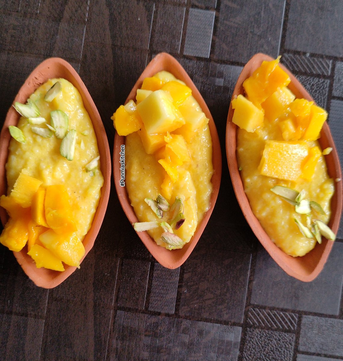 Summer season mango special 
here is my twist to regular Phirni
Poha Aam Phirni 
#Punmiaskitchen #gharkakhaana #mango #summer #phirni 
<a href="/Chefbhasin/">Ashish Bhasin</a> <a href="/ChefKunalKapur/">Kunal Kapur</a> <a href="/ranveerbrar/">Ranveer Brar</a> <a href="/TheVineetBhatia/">Vineet Bhatia MBE</a> <a href="/sailorturndchef/">Chef Simran Singh Thapar</a> <a href="/thefbai/">theFBAI</a> <a href="/VikhroliCucina/">Vikhroli Cucina</a> <a href="/ChefPin1/">Chef Pin</a> <a href="/FoodiesofIndia/">Foodies of India</a> <a href="/chefrehmanLko/">Dr Chef-Rehman Mujeebur</a>