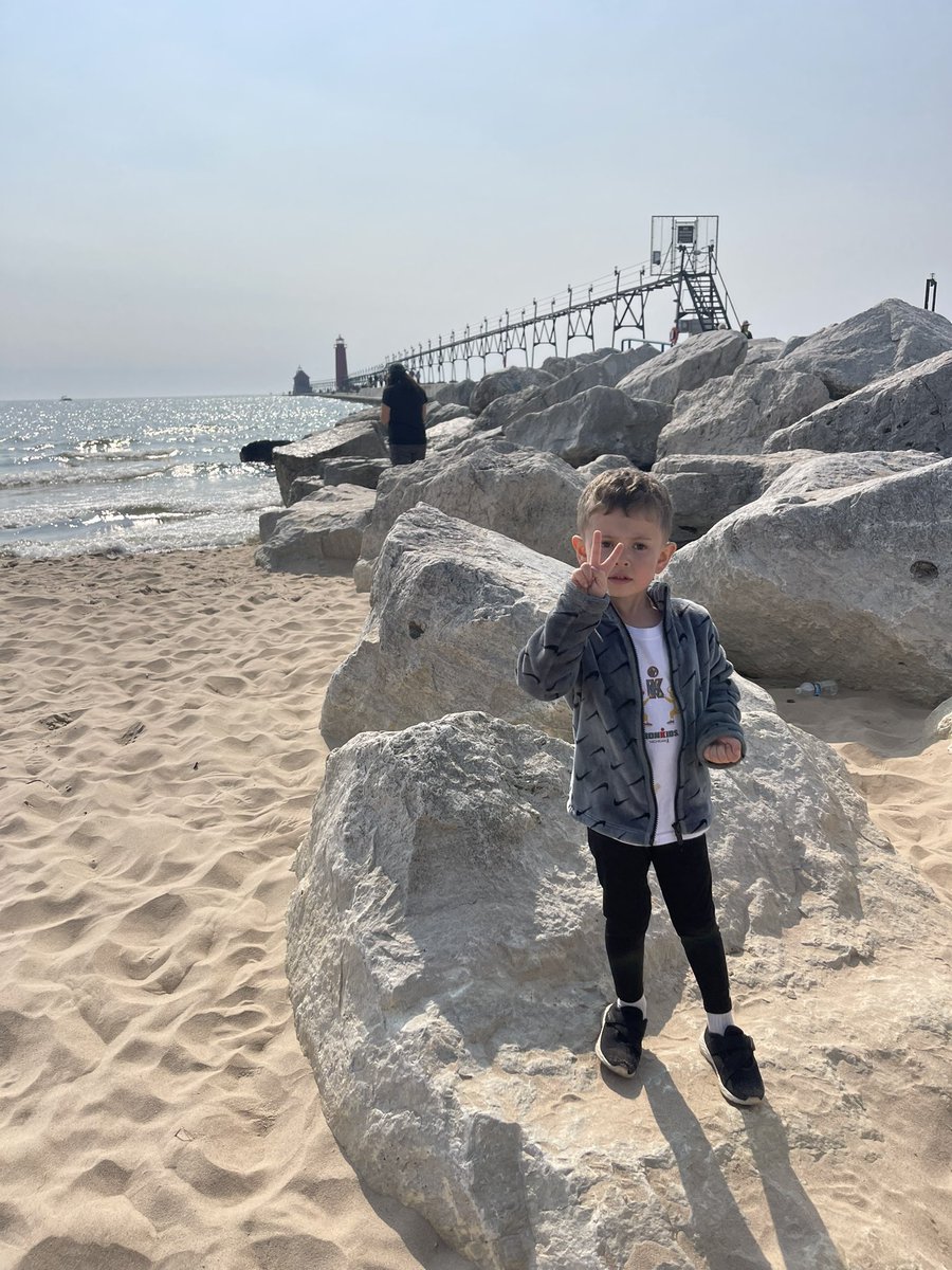 My son living his best life. #PureMichigan #GrandHaven #Michigan #LakeLife #LightHouse #LakeMichigan #FreshCoast #SaltFree