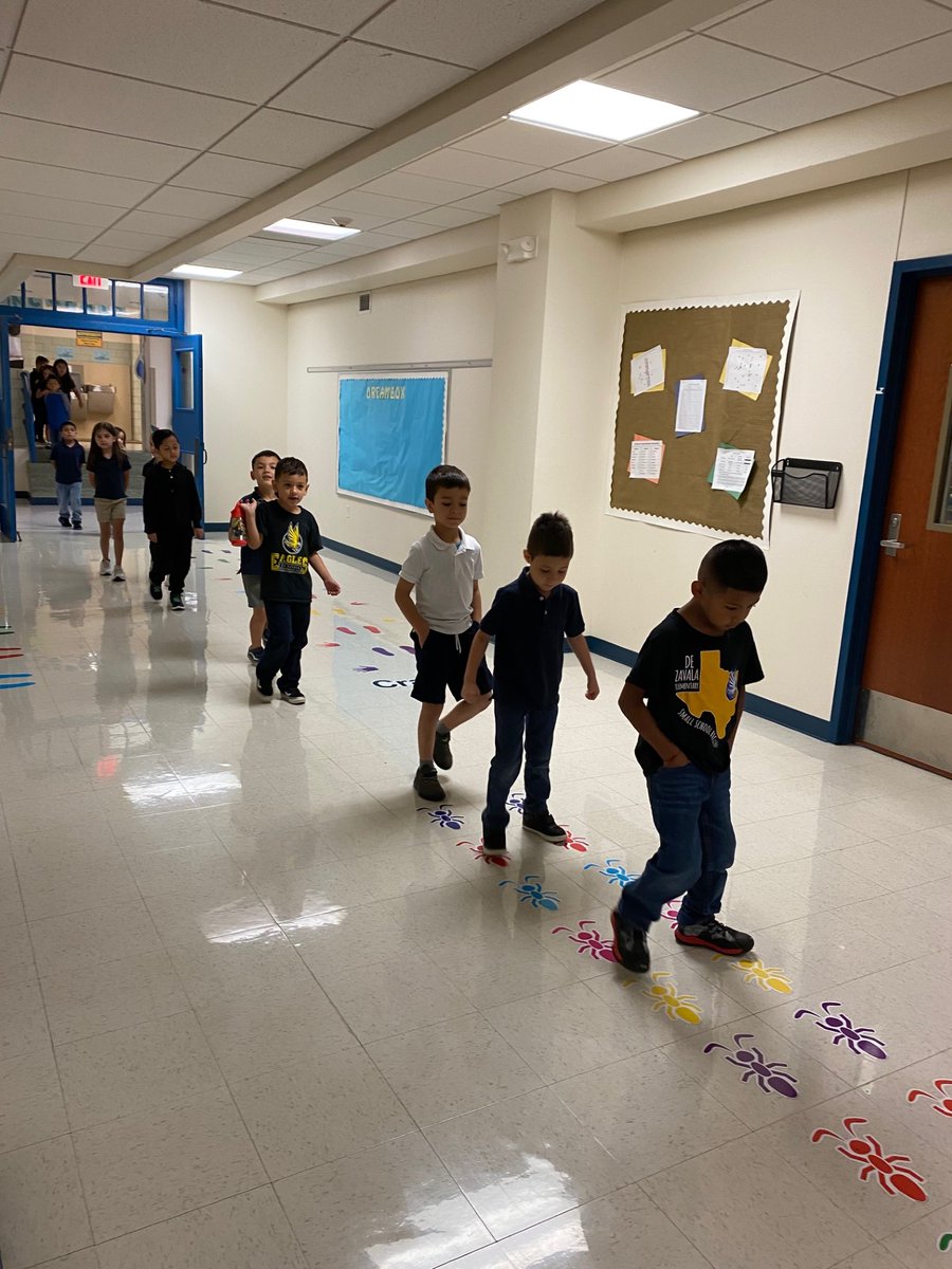 De Zavala music teacher, Mrs. Dean, is bringing Mrs. Torres' Kinder students back from Promotion Ceremonies rehearsal! They sounded good! #Panther4Life @jillbalzer @MarletteMartin1 @lchoagland