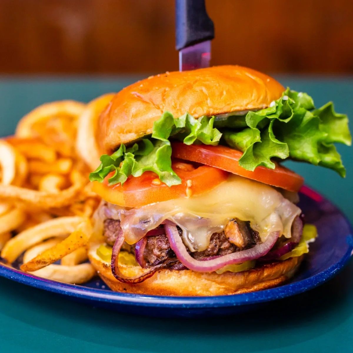 Hungry? Let us satiate that hunger with our juicy cheeseburgers and crispy fries! #AustinEats