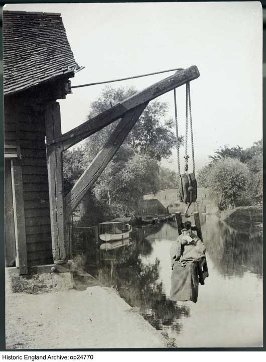 HE_Archive's tweet photo. Today's image from the Historic England Archive shows a not very well disguised youth demonstrating the ducking stool at Fordwich Town Hall, #Kent.
You can read the List entry for the Town Hall at https://t.co/GSiMTycafx
#FordwichTownHall
#DuckingStool
#PoorDisguise https://t.co/QrqQpjHuPv