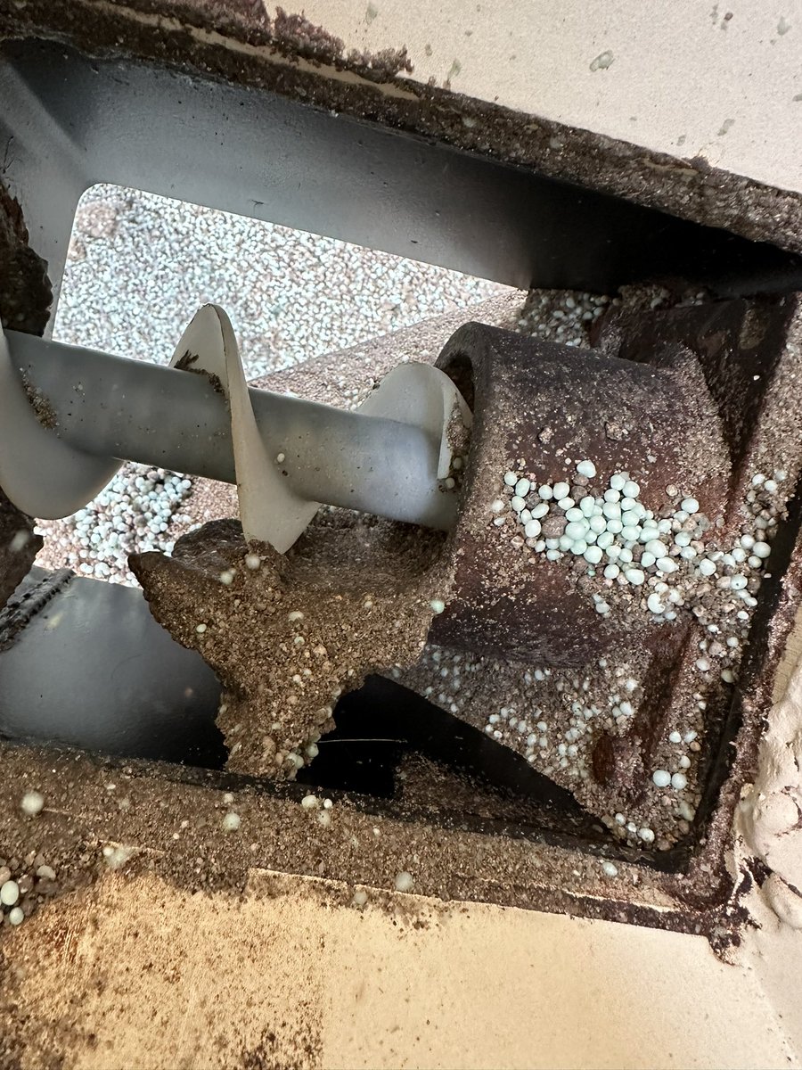 kcampion2's tweet photo. Fertilizer clumping/caking on manifolds and in the metering auger.   Bad enough to stop the metering auger.   Any Tips/tricks/suggestions?   This is just from 40 acres worth.  Any help is much appreciated #AgTwitter https://t.co/kj3MK4gB6u