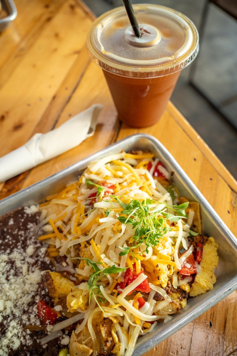 Fuel your day with the good stuff. 🌞

Featuring our Chilaquiles Amigos with chorizo and an iced americano. 🔥 

See you here. 🫶🏽