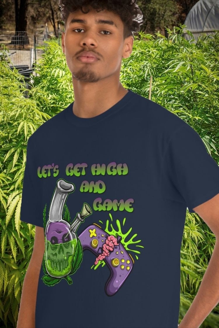 XOGamersX's tweet image. Gamers, level up your wardrobe with this 'Let's Get High' gamer shirt! Perfect for showing off your love for gaming and having a good time 🎮👕 Get yours now at etsy.com/listing/139122… #GamerFashion #LetsGetHigh #GamingCommunity #blaze #CannabisCommunity #Xbox #twitchgaming