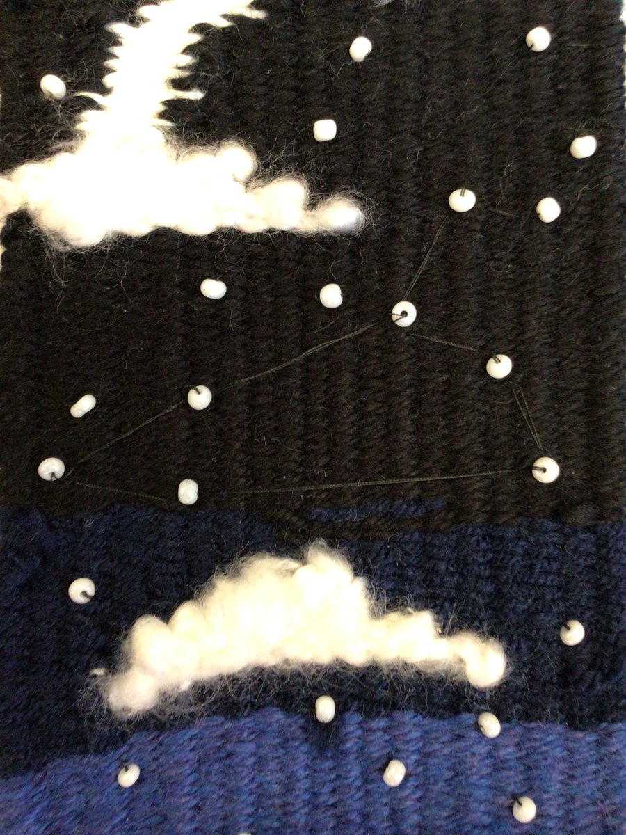 yorkart2111's tweet photo. I could stargaze at this 7th grade weaving all day long. The tight weft, variety of fibers, and embellishment with beads is above the rest! Look closely and you can see Leo drawn in! Uplifting to see the outcome of focus & dedication! #weaving #K12ArtChat #MustMakeMon #astronomy https://t.co/3kvNTG23Xd