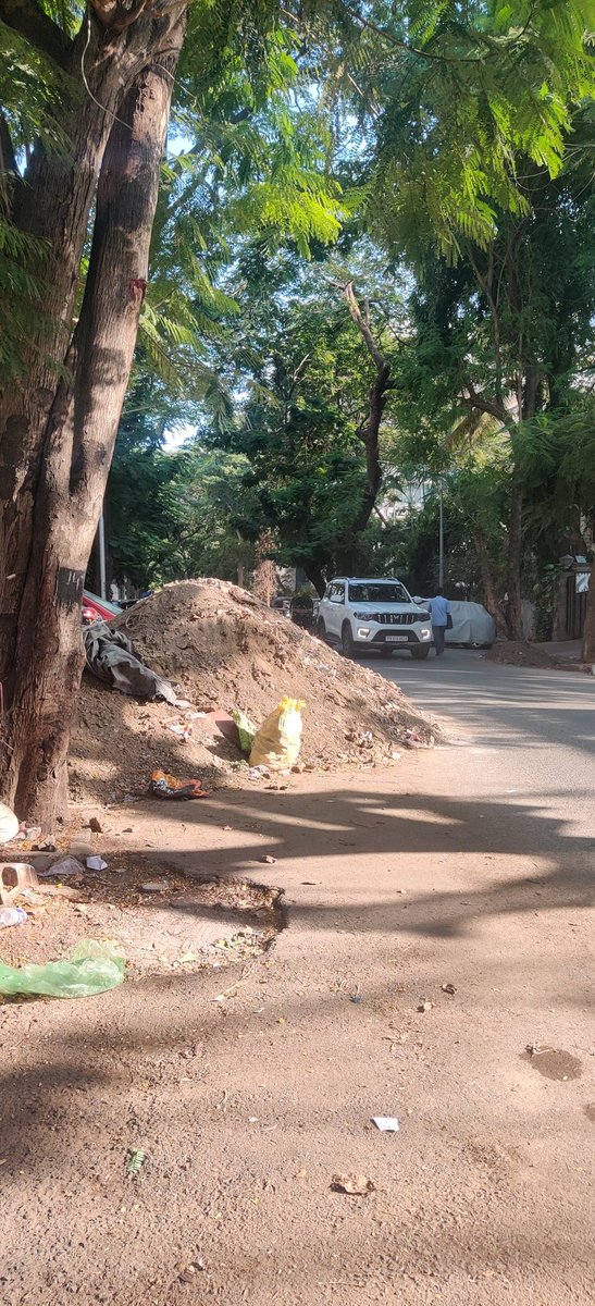 bhaktimahendra's tweet photo. @mybmcwardKW while we appreciate the work undertaken before monsoon . But request you look into removal of this at your earliest . This is on N.S road no 5 opp bangs salon . It's such a big dump almost coming on road . https://t.co/2fC1d9kA6l