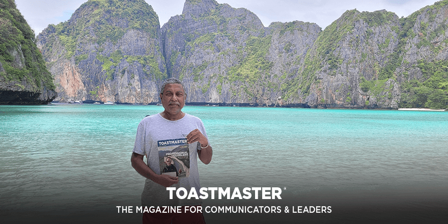 Toastmasters: Mohan Morais of Colombo, Sri Lanka, vacations on Maya Beach in Phuket, Thailand with a printed copy of the Toastmaster. 
#toastmasters #phuket #thailand  #btm #Toastmasters #Communication #Leadership