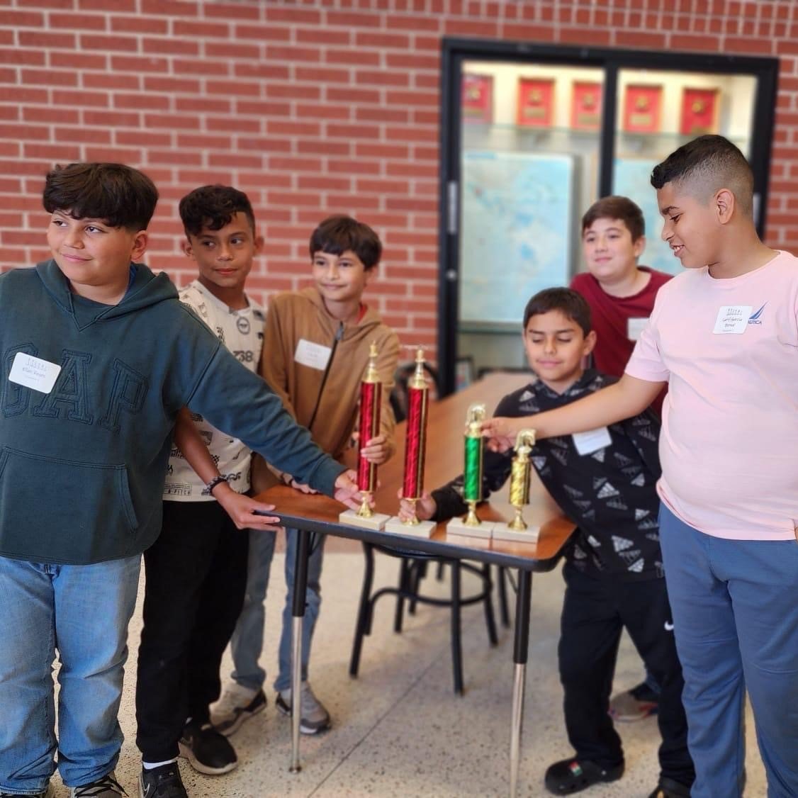 DPISD_DWE's tweet photo. Congratulations to our DWE Chess Club who competed this weekend in Pasadena ISD. Our 5th grade team took the 1st Place Team trophy, as well as three individuals placing 5th, 3rd and 1st out of 39 students. https://t.co/7N5er5rtmQ