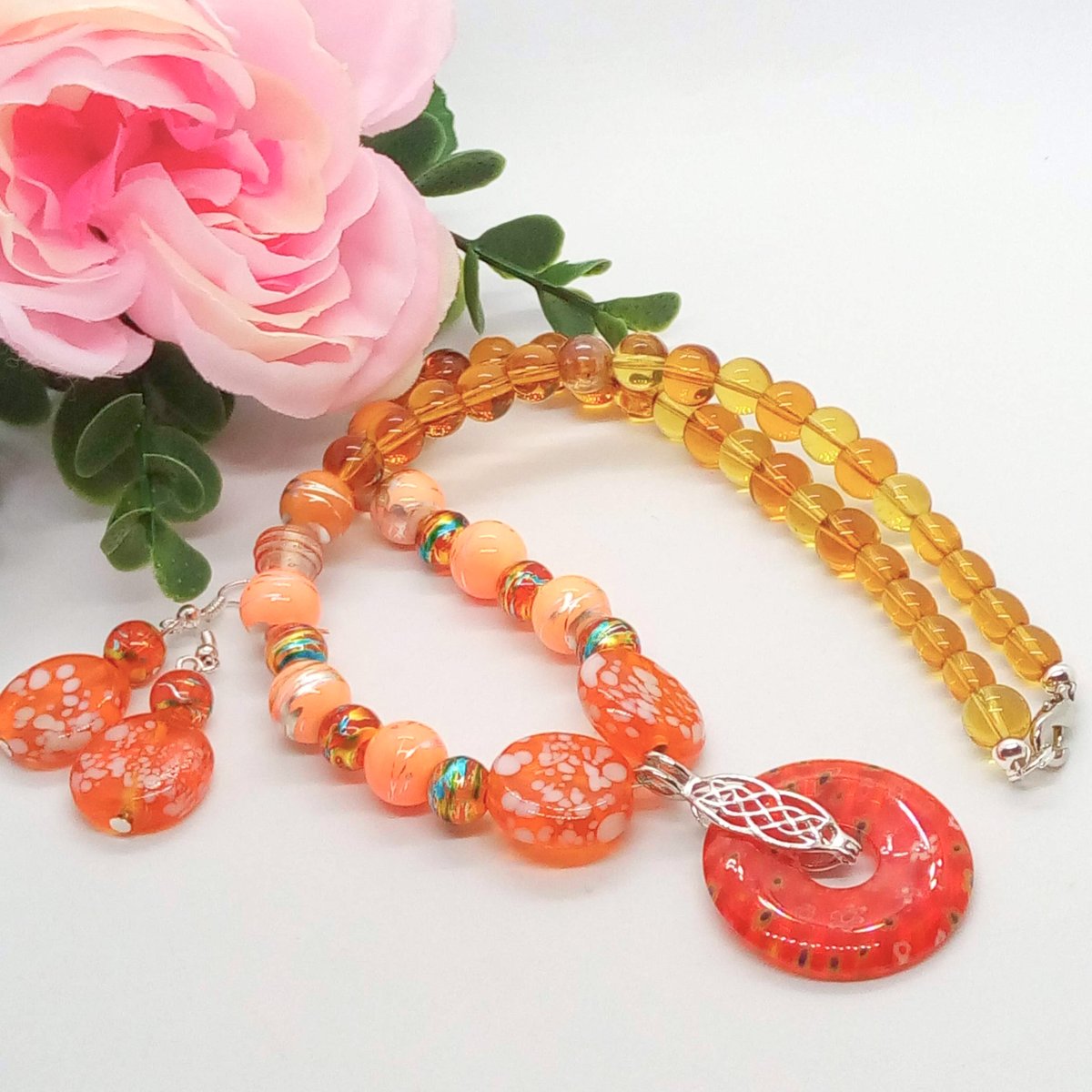 A Millefiori Pendant on a Yellow & Orange Beaded Necklace & Earrings will help you step into Summer. It costs £20 + P&P & can be posted to you today. folksy.com/items/7895752-… #newonfolksy #folksy365 #oswestryjewels #orangenecklace #orangeearrings #millefiorijewellery #giftforher