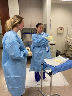 TCUNursing's tweet photo. Students from NURS:30340 Perioperative Directed Study instructed by Professors Gassett and Garcia, in collaboration with students and professors from Baylor University and The University of Texas at Arlington. Students practiced gowning, gloving, prepping the skin in the OR. https://t.co/7bcU1JF9Tb