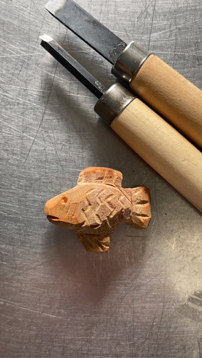 CryptidSeth's tweet photo. Carved a fish! Specifically a bass fish 🐟  Used an avocado pit

Working on painting already 

#woodcarving https://t.co/sox7xTmOBu