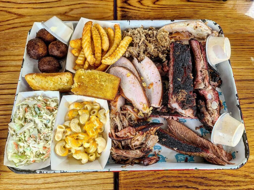 Pitmaster Combo:
whole hog, pork shoulder, chicken, turkey, brisket, &amp; ribs with crinkle cut fries, mac &amp; cheese, hush puppies, corn bread, and cole slaw

#BehradEats #CharlestonSC
#RodneyScottsBBQ #WholeHogBBQ