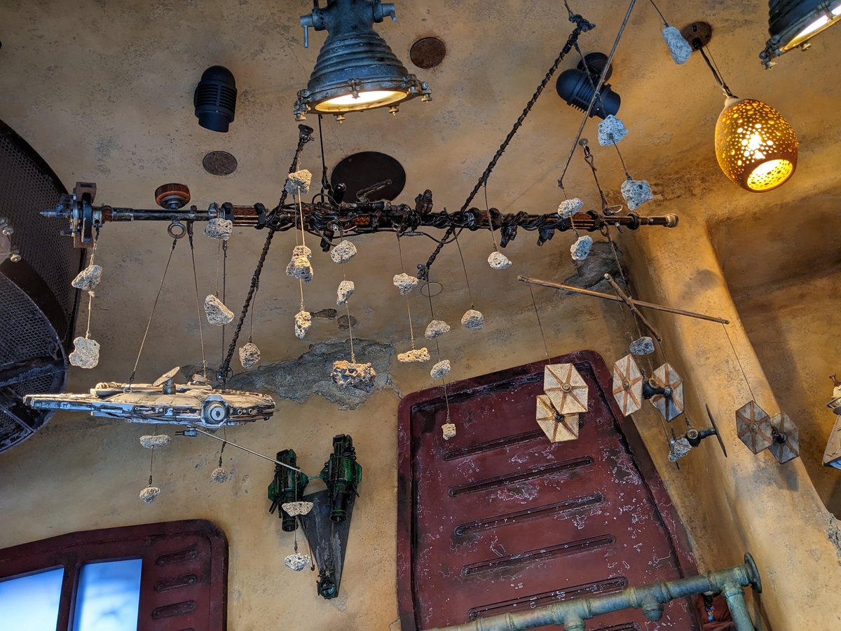 cstephens2's tweet photo. Love the decorations high above in the toy store. #BlackSpireOutpost #GalaxysEdge #StarWarsGalaxysEdge #batuu #Disneyland #magicisback #magicishere #StarWars 1/2 https://t.co/89Q6EPcdaA