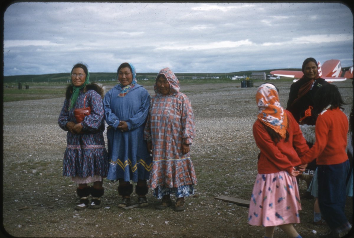 July 4, 1955, a group of women in Kotzebue. The three women facing camera together are, from left to right, Alta Wilson, Maggie Melton, and Bessie Barr. Via Anchorage Museum. #alaskahistory #alaska #kotzebuehistory #kotzebue