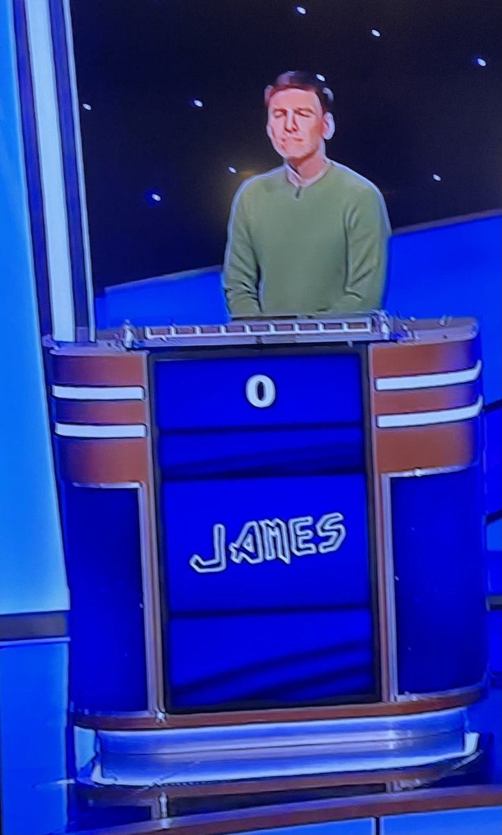 Digging that <a href="/James_Holzhauer/">James Holzhauer</a> is writing his name in the <a href="/IronMaiden/">Iron Maiden</a> font on #JeopardyMasters.