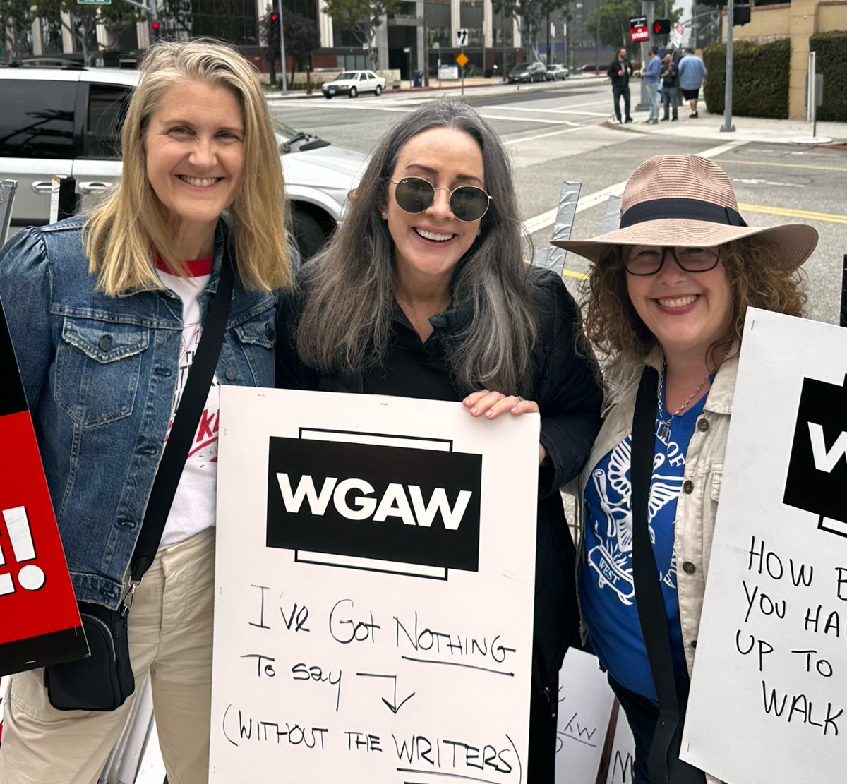 PatriciaHeaton's tweet photo. Supporting the @WGAWest  and catching up with our genius Middle creators/show-runners @EileenHeisler  and @DeAnnHeline.  Writing is the foundation, the bedrock of film and television, and without writers there is no entertainment industry. They should be among the highest paid employees in the business. To cut back on a system that has consistently worked, not only in producing superb scripts but also in training the next generation, makes no sense. #WGAstrike