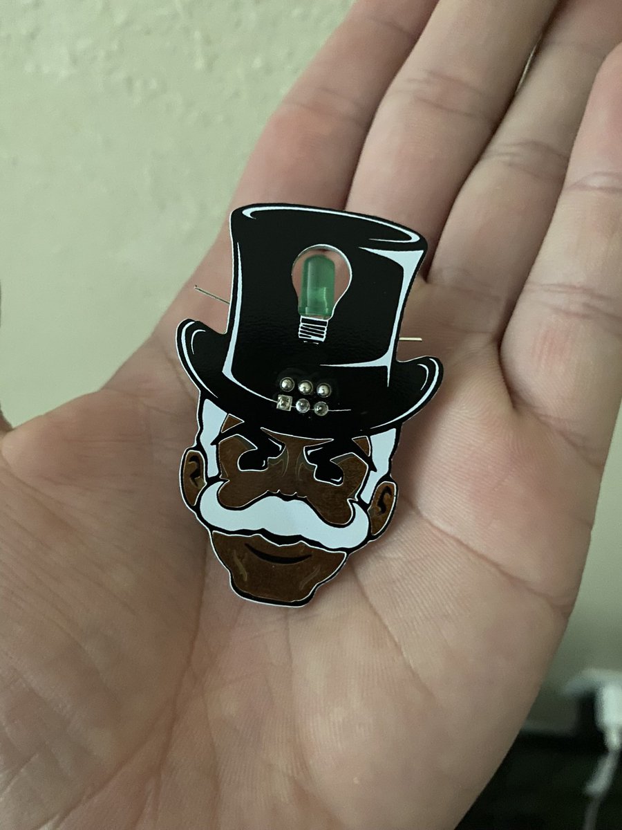 I made this little guy in the Lock Picking / Soldering village at #THOTCON. This was my first time. It works, but it needs a little lithium battery to power that green light. #FSociety #MrRobot