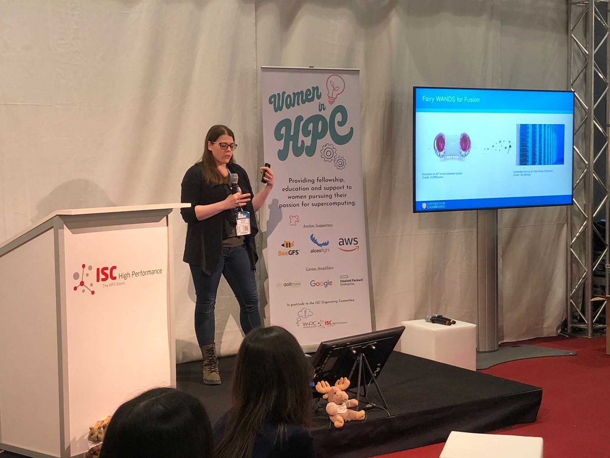 Stefanie Reuter from the lab giving a lightning talk at the @women_in_hpc takeover in the @ISChpc exhibition. It is to promote her poster on linking the @UKAEAofficial MAST-U reactor and @CambridgeRcs supercomputer.

#HPC #ISC23 #WHPC