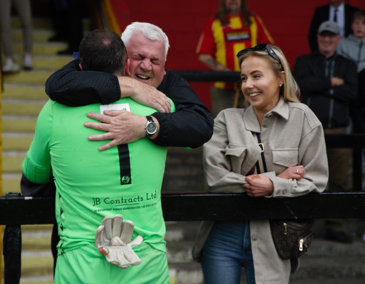 📷 All you need is glove. 

One of my favourites from Saturday’s Pyramid Play-off Final, catching a lovely moment where <a href="/spartansfc/">The Spartans FC</a> keeper <a href="/BlairCarswell1/">Blair Carswell</a> is embraced by his dad Allan, himself a former top shot stopper, after gaining a historic promotion to the <a href="/spfl/">SPFL</a>.