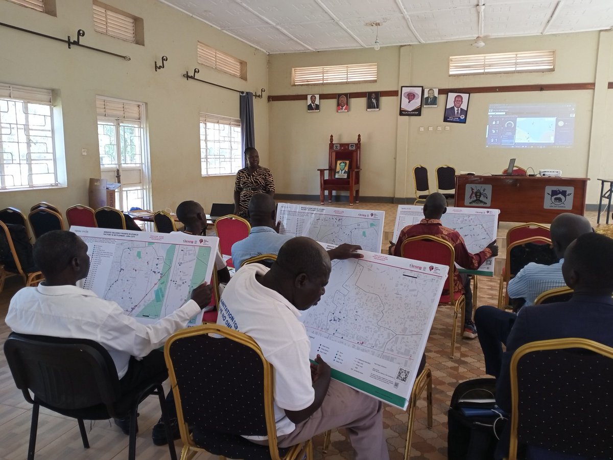 Local leaders having a look at the maps of their settlements☺️