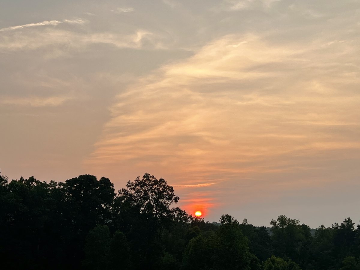 Canadian forest fire smoke makes for beautiful North Carolina sunsets. 
#livinganywhere #travel #roadtrip #luxurytravel #travelphotography #sunsetphotography #PilotMountain