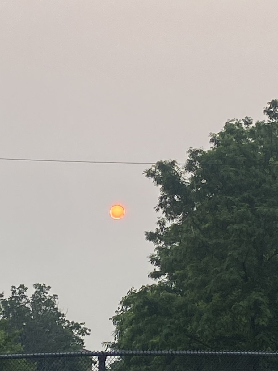StrokeDriven's tweet photo. The smoke from the fires in Canada made the sunset appear RED this morning.  It was so creepy.  It’s insane how we can smell the smoke out here and the skies are hazy. https://t.co/ycSLXPEEjm