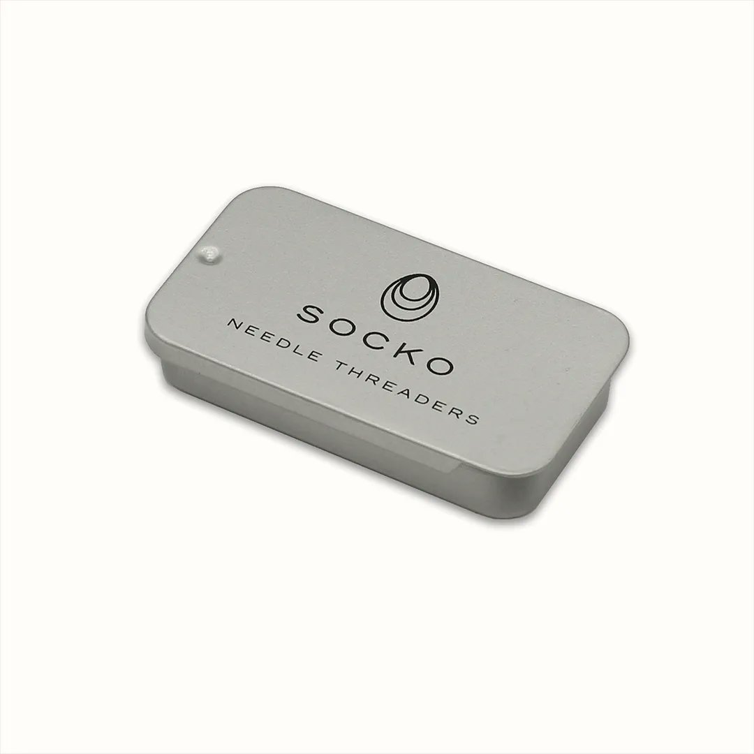 SockoShop's tweet image. Our needle threaders have been flying this week! 2 robust steel needle threaders in a dinky tin for £4. No more soggy strands, ends sewn in with ease. Get yours from the Clothing Care section of the Socko website 🖱️🪡🛒 #needlethreader #haberdashery #knittingnotions