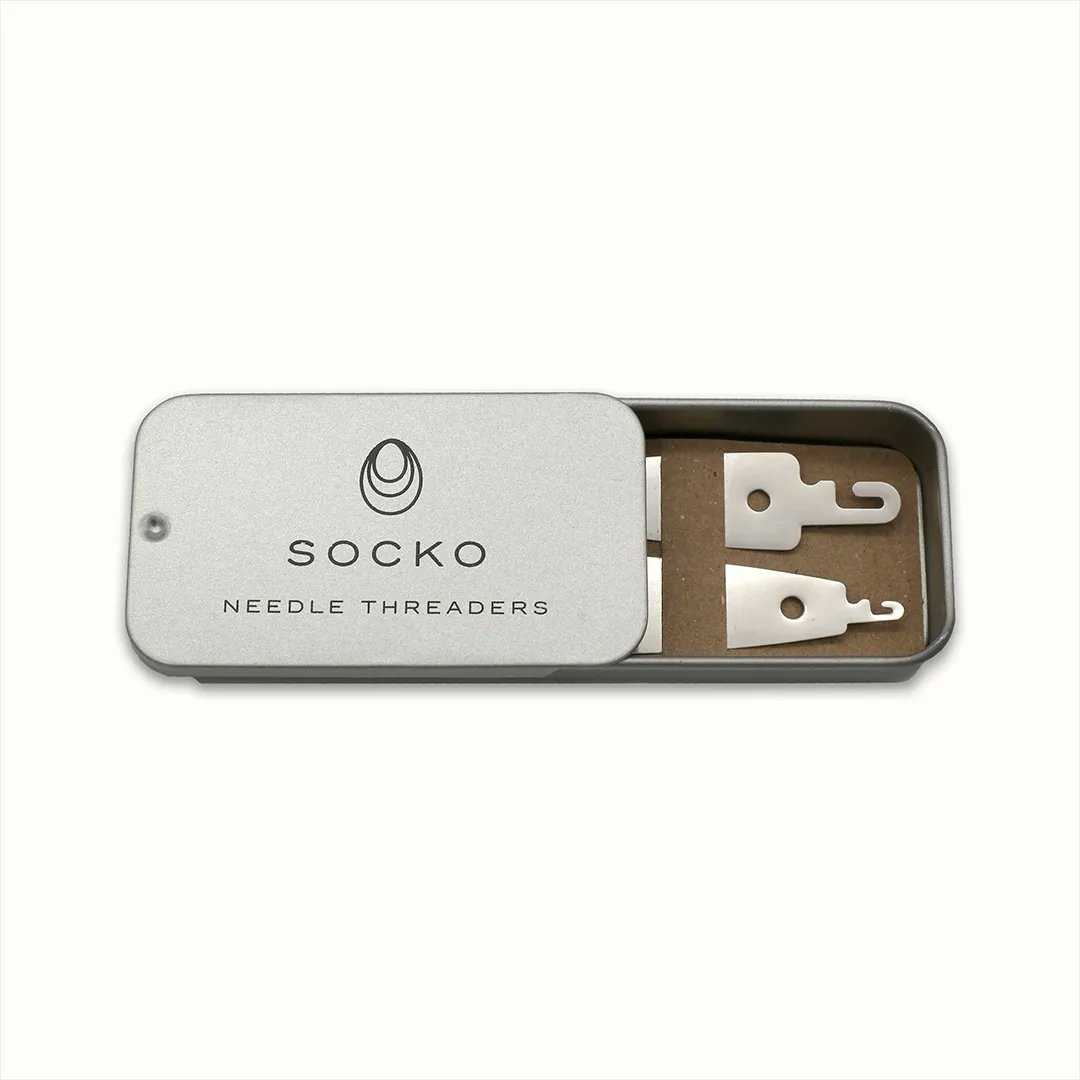 SockoShop's tweet image. Our needle threaders have been flying this week! 2 robust steel needle threaders in a dinky tin for £4. No more soggy strands, ends sewn in with ease. Get yours from the Clothing Care section of the Socko website 🖱️🪡🛒 #needlethreader #haberdashery #knittingnotions