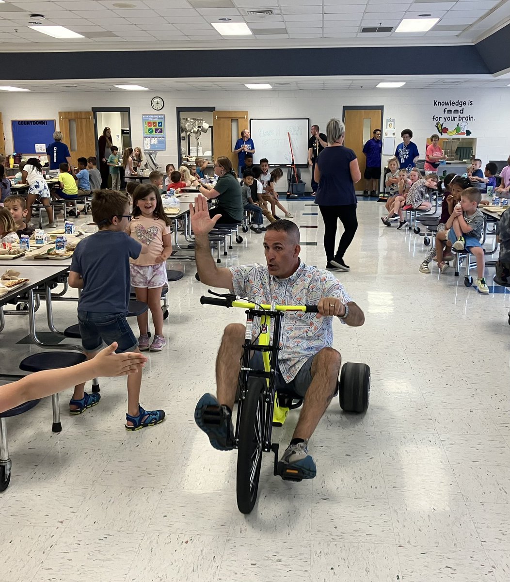 The excitement a trike can bring as you ride it through a cafeteria!  #principalsinaction @theVAESP #kidsdeserveit @RazorWorldwide @NAESP