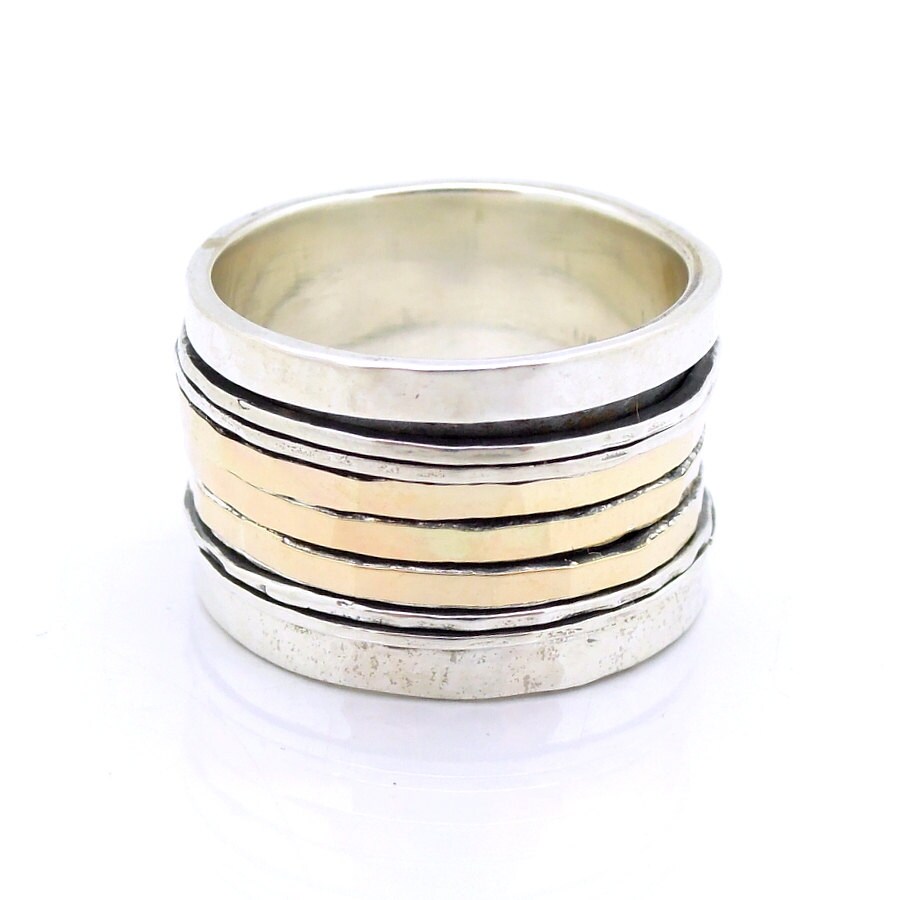 reuvenshabat's tweet photo. Excited to share the latest addition to my #etsy shop: Reserved for Cassie Wide silver spinner ring with gold & sterling swivel bands https://t.co/g5fTluljaA #wedding #men #silver #silverring #silverband #goldring #goldband #widering #wideband https://t.co/cZqBPhlgtJ