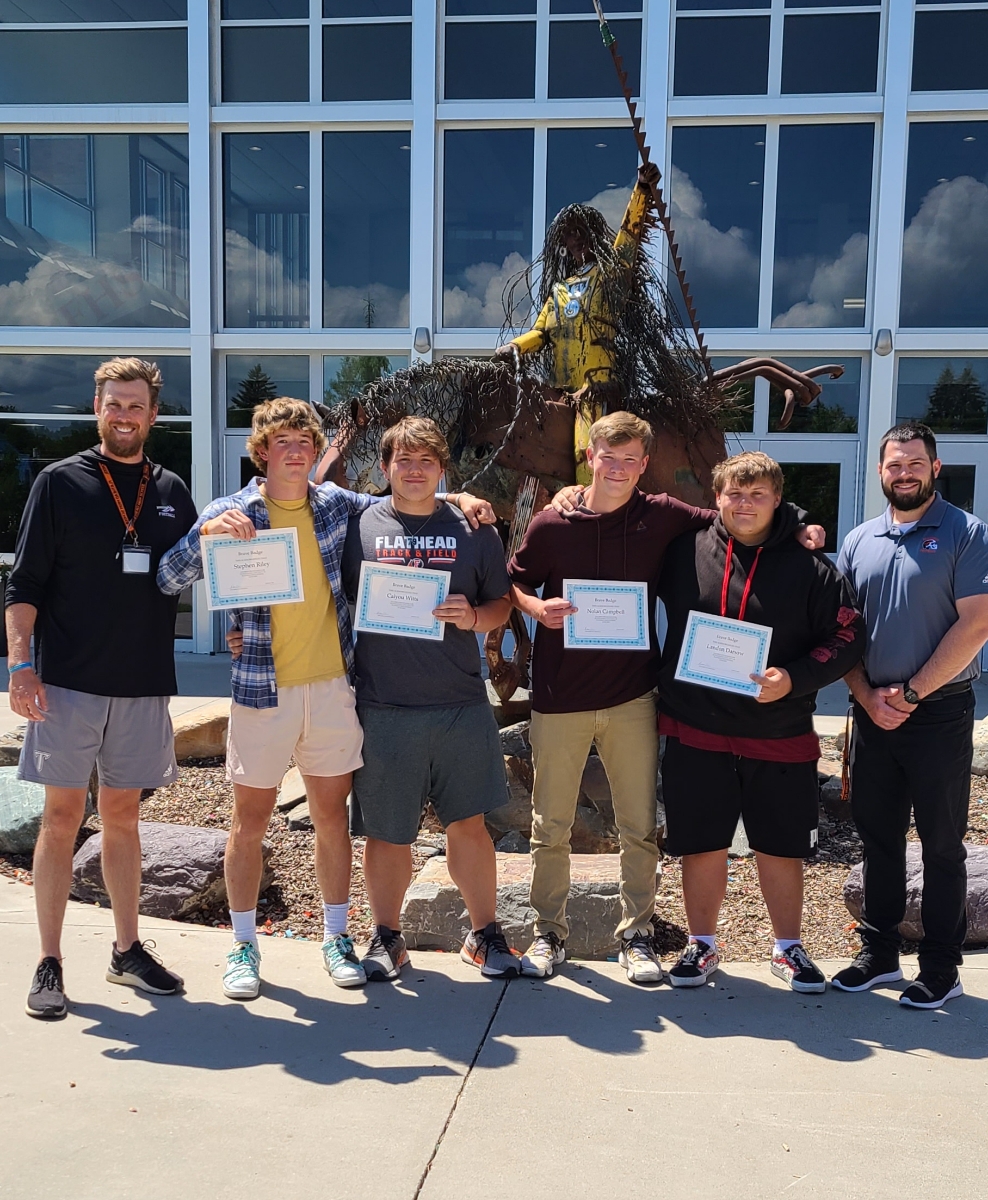 Flathead_HS's tweet photo. These 4 fine students pitched in alongside Coach Aland and Mr. Allison to help carry people when the FHS elevator broke down during the graduation ceremony.  Stephen Riley, Caiyou Witt, Nolan Campbell, and Landen Darsow earned a Brave Badge award for their actions.  Thanks, guys! https://t.co/RGk8gQlK9O