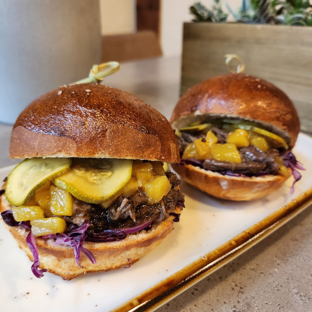 Chef Bryan @lvl1_chef &amp; his kitchen team are flexing those culinary muscles again!!

Available for a limited time: SHORT RIB SLIDERS

house baked brioche buns, juicy short rib meat, purple cabbage slaw, zippy zucchini pickles &amp; a pineapple compote
