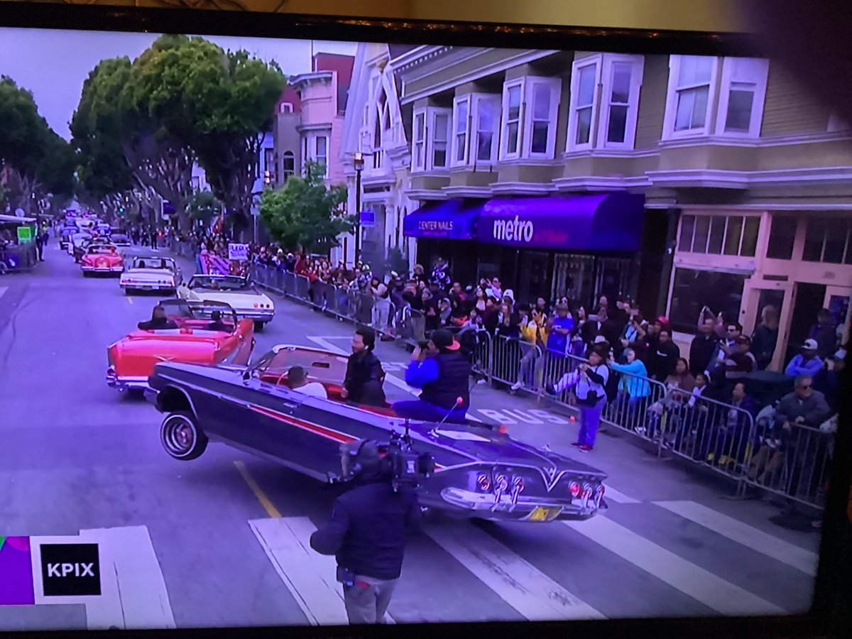 Carnivale in San Francisco as low riders line Mission St.