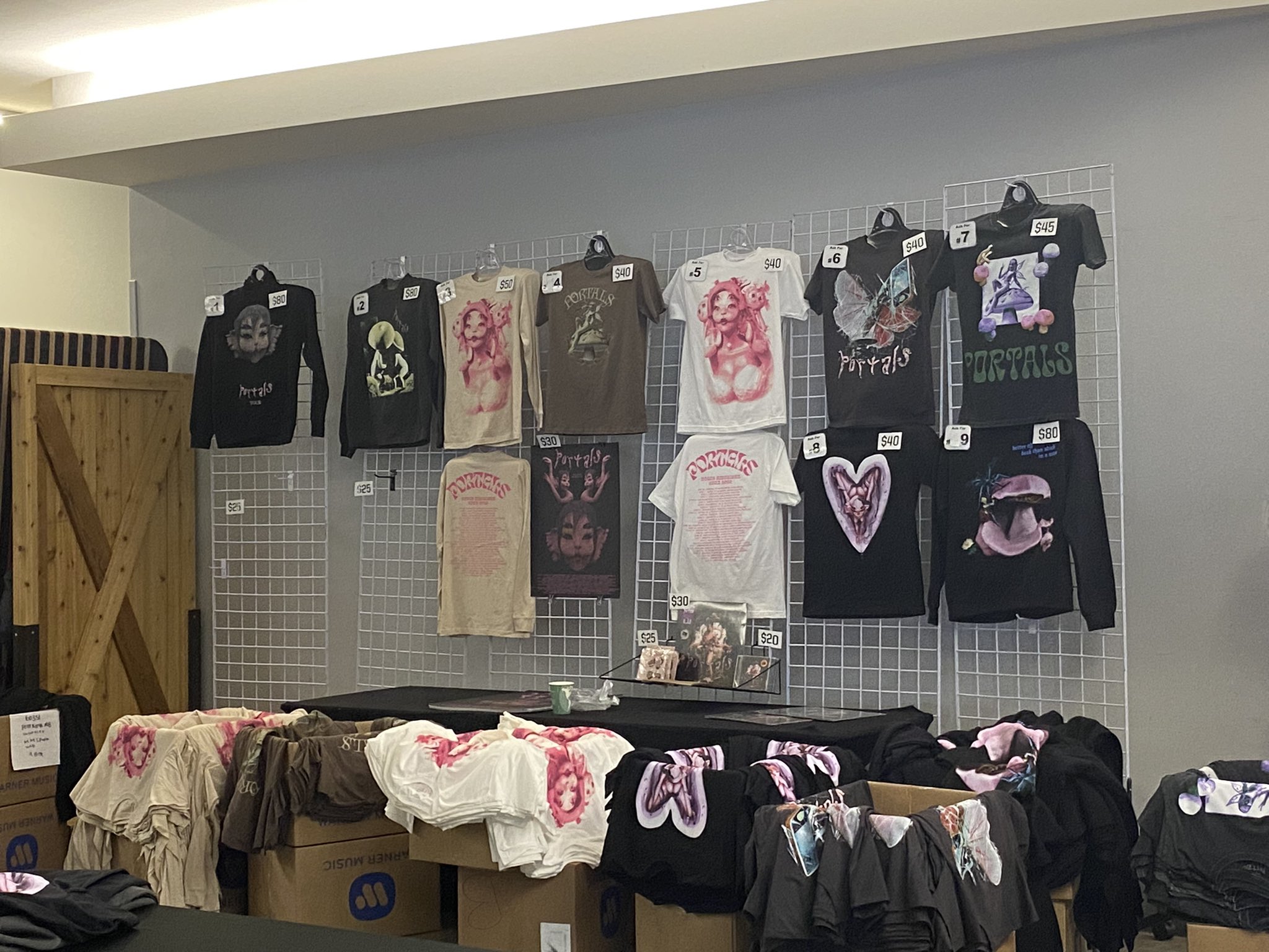 matthew on X: Merch stand at Melanie Martinez's PORTALS show tonight.   / X