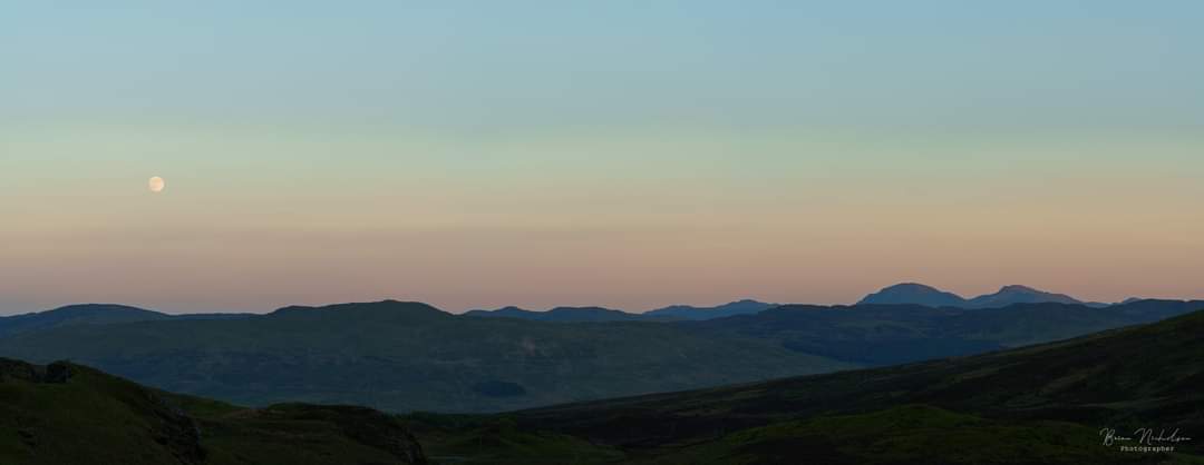 On Friday evening I was at Lochan na Lairige , close to the start of the hike to Ben Lawyer's, I got myself to a vantage point to photograph the moon as it it rose through the belt of venus.

#fsprintmonday
#moonrise 
#panoramicview
