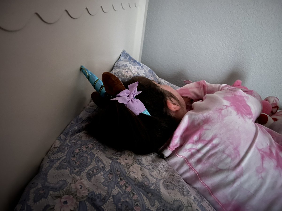 MarleeGinter's tweet photo. Hoping everyone sleeps like a unicorn princess tonight! LO fell asleep in mins with unicorn tiara on after fun filled weekend @Disneyland  #magical #Disney100 https://t.co/WMHfgBs516