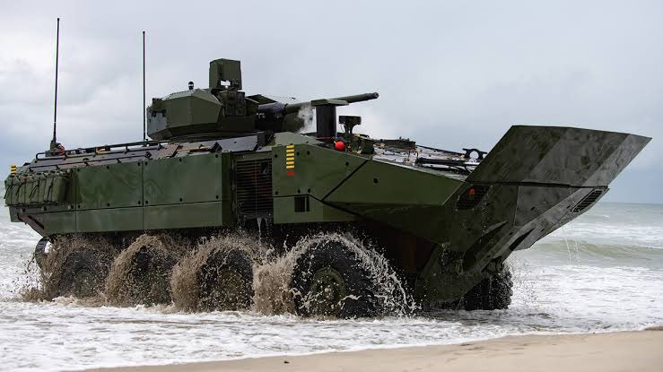 BAE Systems/Iveco yeni nesil ACV aracı için USMC 30mm toplu bir taretli versiyon istemişti.BAE Systems bu konuda Kongsberg ile anlaşarak RT-20nin ABD standartlarına getirilen MCT-30 taretlerle(Medium Caliber Turret) donatılacak ACVlerde MK44 Bushmaster 30mm top bulunacak.