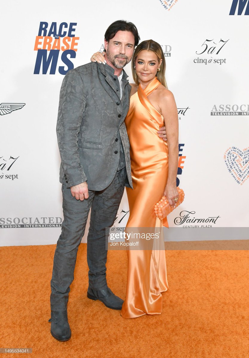 Aaron Phypers and Denise Richards attend the Race To Erase MS 30th Anniversary Gala at Fairmont Century Plaza on June 02, 2023 in Los Angeles, California
