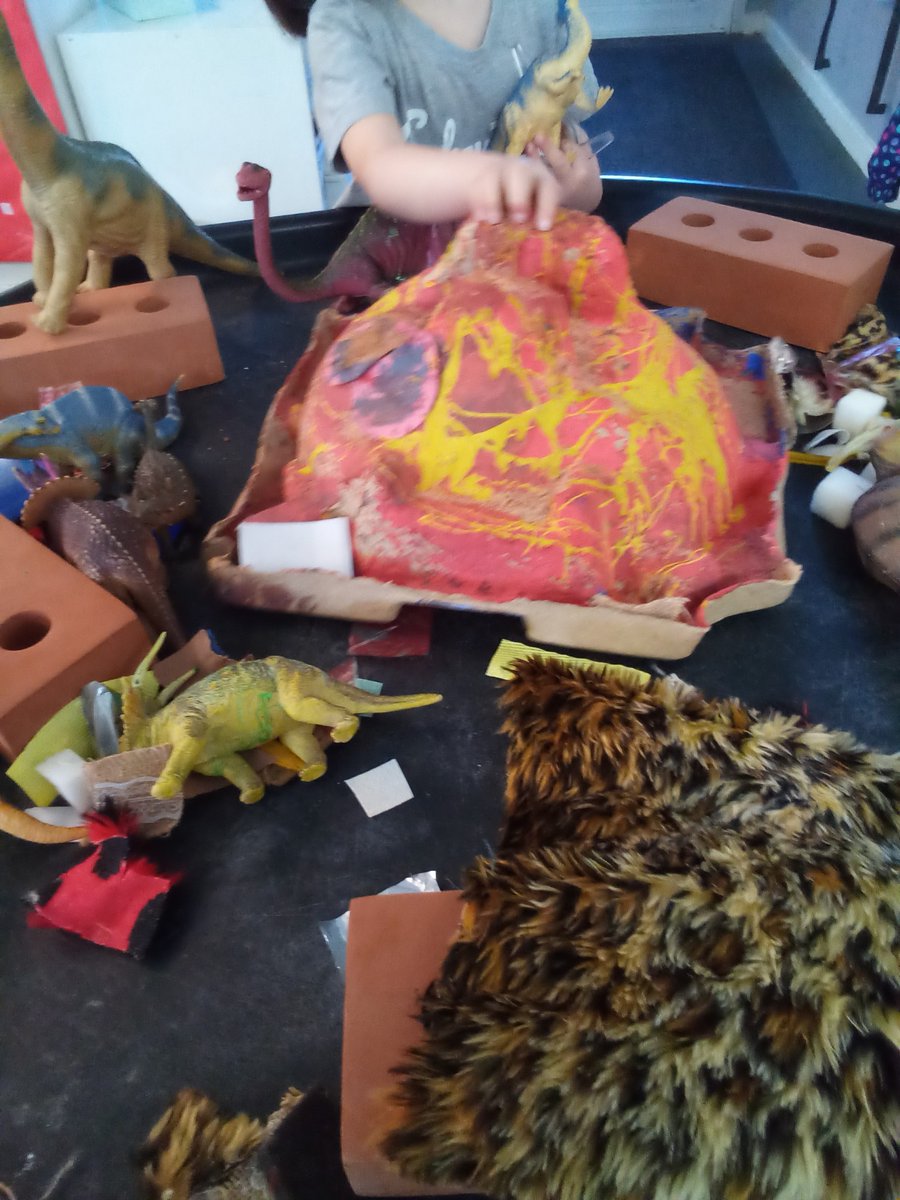 LionsPre's tweet photo. We played with the volcano in our tuff tray with dinosaurs.  The children put on a talent show outside. They took it in turns to sing and dance, showing their best skills. There was some beautiful jumping and twirling. https://t.co/CXIdtCVBap