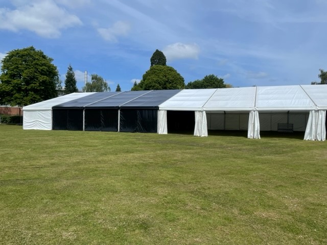 allundercover's tweet photo. Bourne Festival charity event. 20m x 45m with black PVC roofs &amp; walls for the stage area. Green room hidden by a black PVC wall https://t.co/Yb39bqYDNP