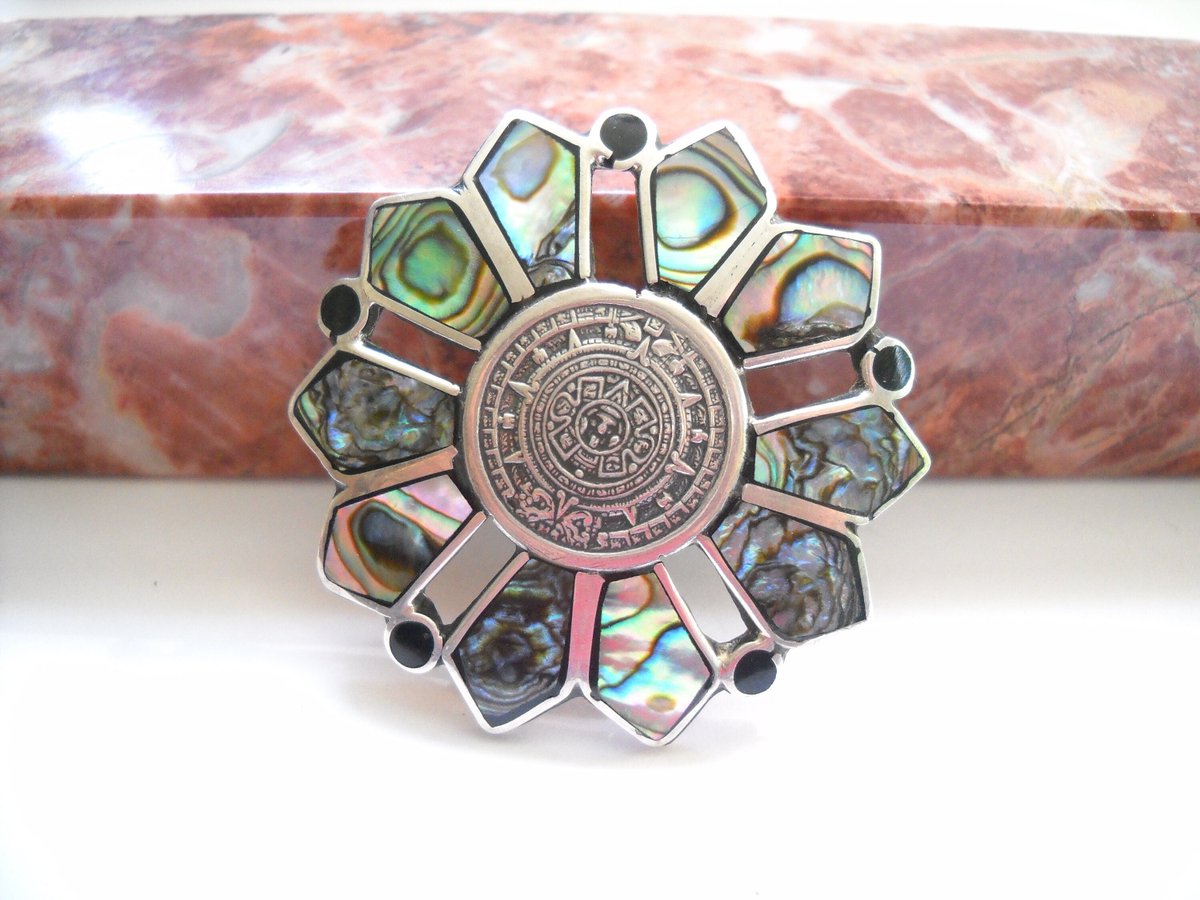 Excited to share the latest addition to my #etsy shop: Vintage Brooch Pendant Mexico Sterling Silver Abalone Onyx Aztec Calendar TC 101 925 Taxco Boho Folk Silver Jewelry Statement Jewelry etsy.me/3qvOClC #blue #birthday #christmas #beachtropical #silver #unise