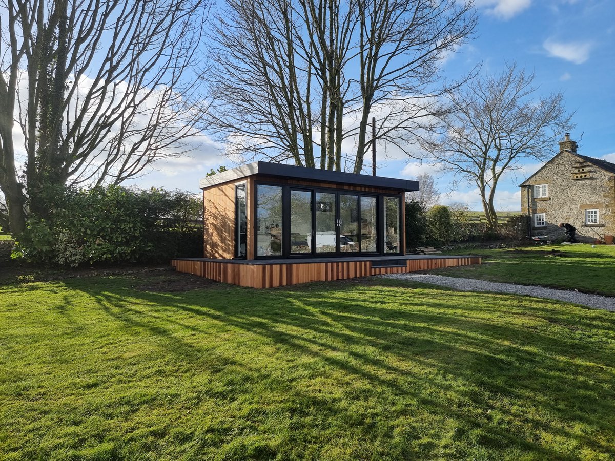 Premium quality #gardenoffice; double sliding patio doors, cedar clad, composite decking. This one sits majestically in its grounds & complements the traditional style of the dwelling. These are hand built by our team in the #Midlands
#bespokegardenroom #madeinderbyshire  #ukmfg
