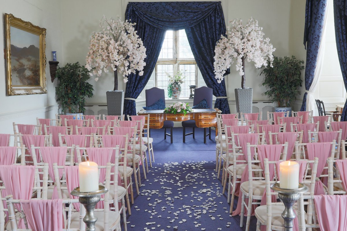 A romantic room with opulent tapestries and luxurious drapes creating a magical setting to say “I do”  Soft light gently falls through tall feature windows highlighting an elegant room with a feature fireplace and ornately carved ceiling. Isn't it just beautiful!😍 💍 🏰