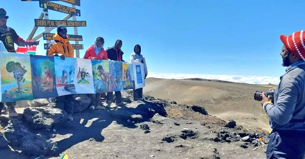 AT THE ROOF OF AFRICA

This is us spending #AfricaDay2023 At the Highest Point of Africa. (Uhuru Peak 5895m high). I was among the team that represented my country Uganda 🇺🇬 at the #AfricaDayKiliChallenge Climb in Moshi. Here is a thread of how the expedition went.
