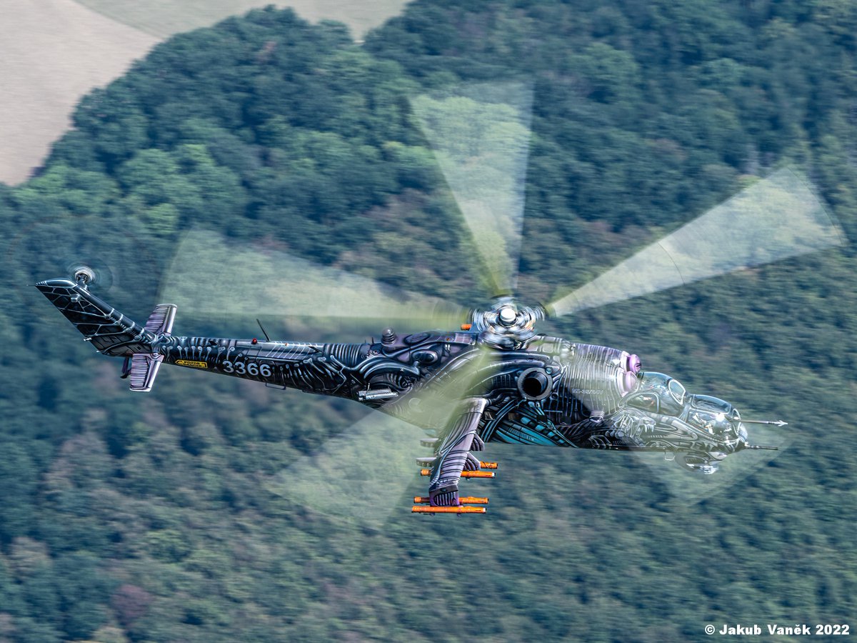 jakub_vanek's tweet photo. One of the special colored Czech AirForce Mi24V Hind "Alien2" on the way to SIAF 2022 Airshow.

Photoflight organized by Ironbird.

#air2air #avgeek #heli #czechaf #czechairforce #221sqn #SIAF #SIAF2022 #militaryhelicopter #mondayphoto #mondaypicture https://t.co/EwgwdVMVcF