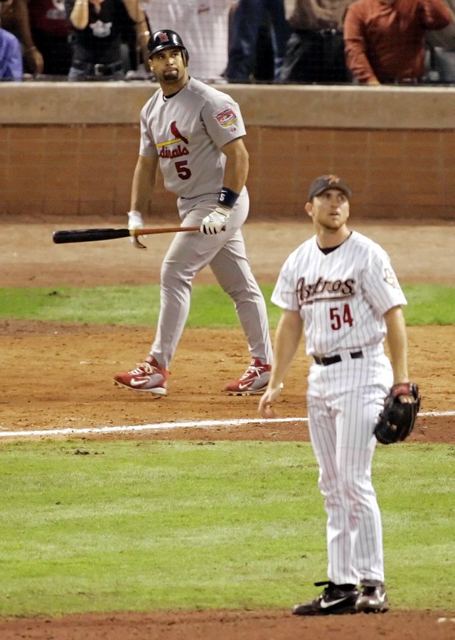 Albert Pujols watches a mammoth three run home run he hit off Brad Lidge to take the lead in game 5 of the 2005 NLCS