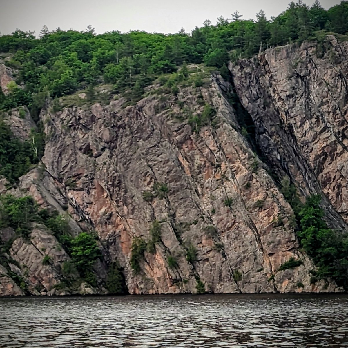 Bon Echo Prov Park -- Here is the view from the beach a short cut thru from our site...stunning...this is Algonquin county!!...there are Petroglyphs hundreds of years old on cliffs around here...if you look at the square picture long enough you can see an old mans face I think.