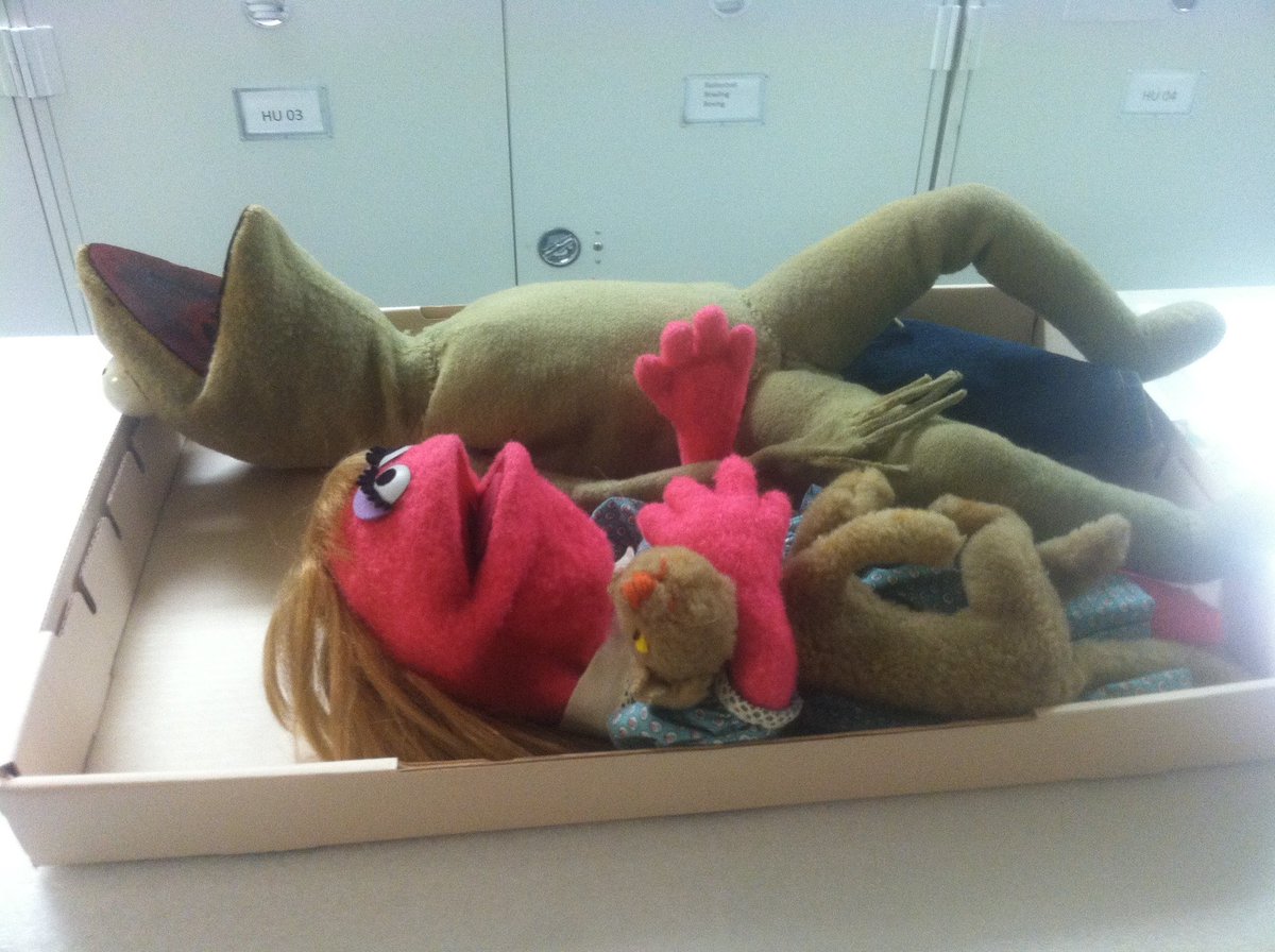 procrastiwrite's tweet image. I got to visit the muppet closet once and the curator presented Kermit to me like he was ready for dissection. Also, poor Bert was shoved into the corner.