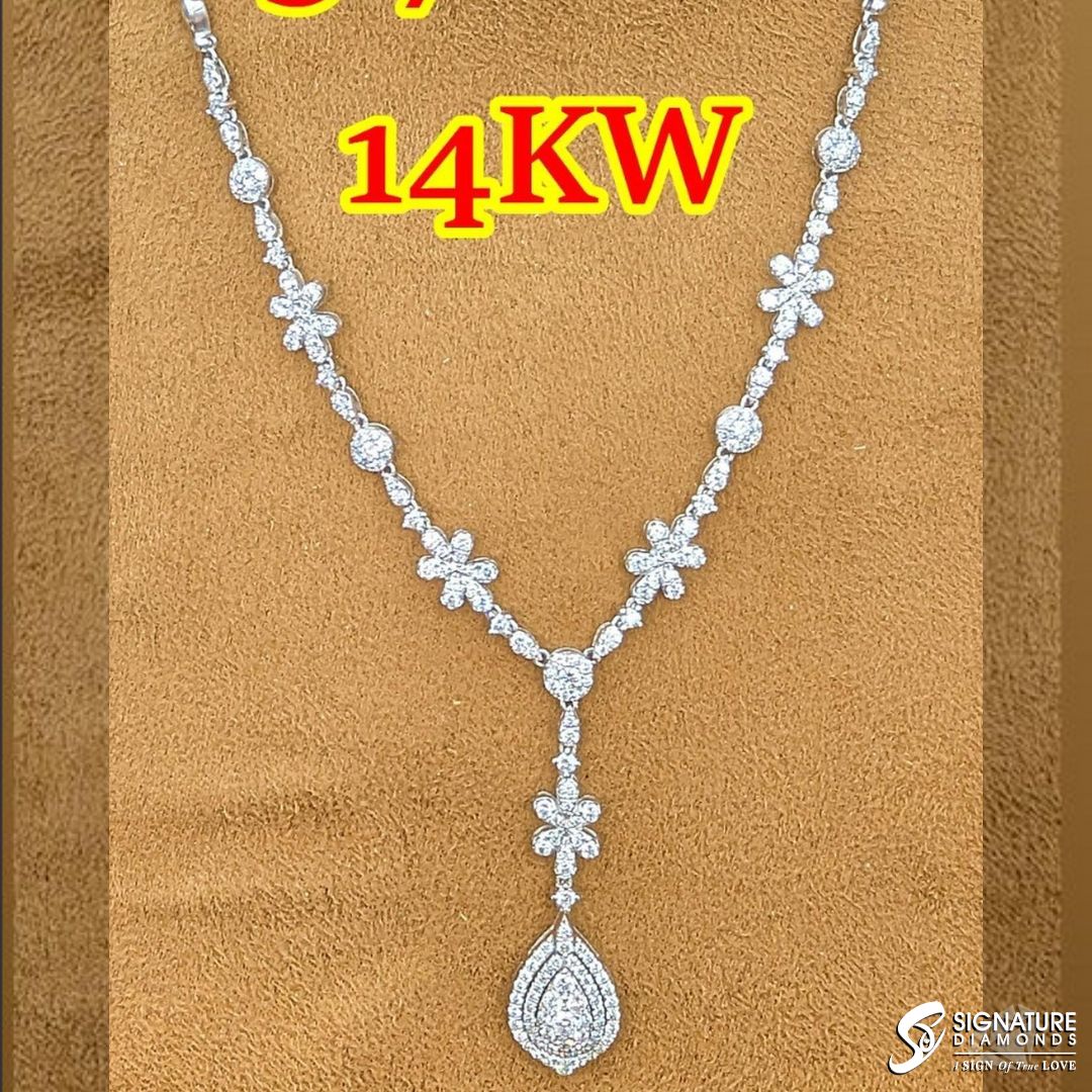 Make an unforgettable impression with this exquisite diamond necklace.

#Jewelry #Necklace #DiamondJewelry #DiamondNecklace #Silver #SilverNecklace #Fashion #Style #SignatureDiamonds #Knoxville #Tennessee #WestTownMall